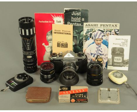 A Pentax Asahi 35 mm SLR camera, with super-Takumar 1:1.8/55 lens, a Canon zoom lens FD 35/70MM, a Tamron zoom F=95-205MM len