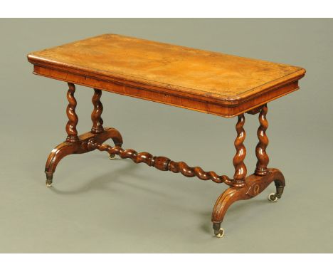 A good Victorian walnut stretcher table, with moulded edge and rounded corners, with foliate and butterfly marquetry and rais