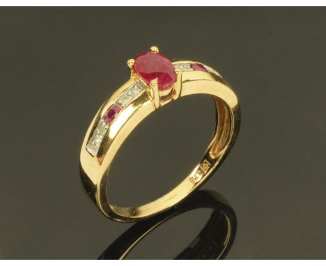 A 9 ct gold ruby and diamond ring, size Q.