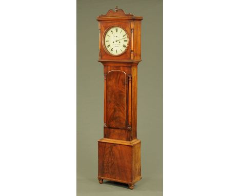 A 19th century mahogany longcase clock, with circular dial and two-train movement by TH Richards, Wexford, with arched trunk 