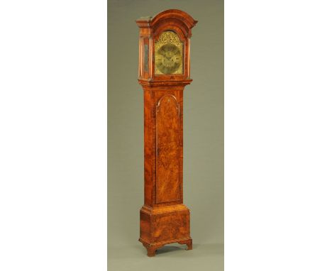 An early 18th century walnut longcase clock, with eight day striking movement by James Gandy, Cockermouth.  Height 253 cm, di