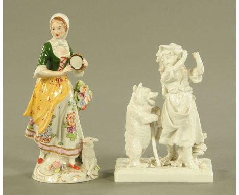 A Continental porcelain figure of a shepherdess with tambourine with lamb at foot, and a Capodimonte porcelain figure group o