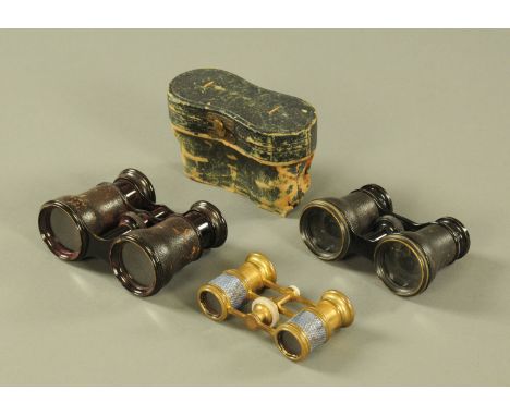 Three pairs of vintage opera glasses, including Duchesse Perfectionee and Zingraff, Paris.   CONDITION REPORT: One of the tra
