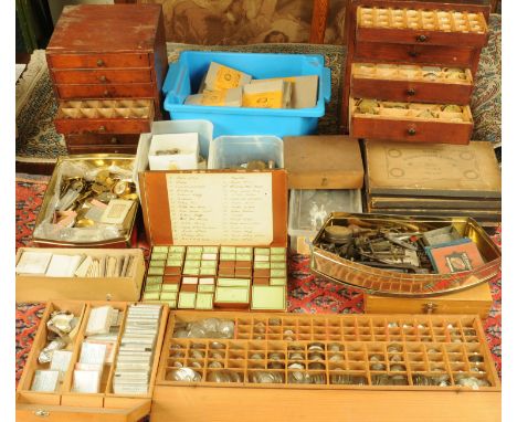 A large collection of watchmakers tools, part pockets watches, watch glasses, main springs, etc. 