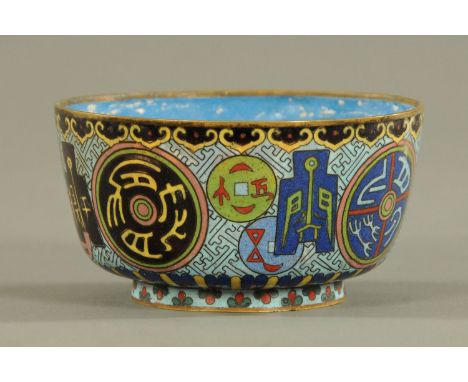 A Chinese bronze censor, Qing dynasty, decorated with Feng with a lotus flower, beneath two lug handles and supported upon th