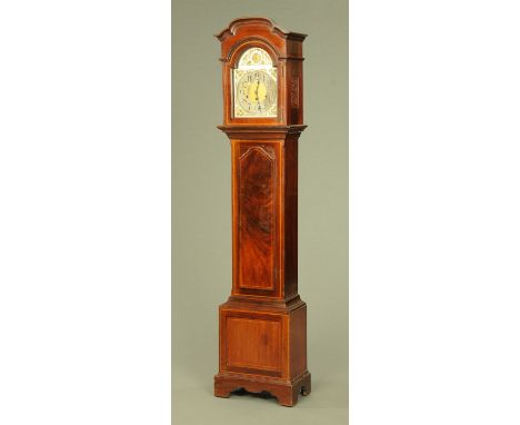 An Edwardian inlaid mahogany longcase clock, with silvered brass dial and Arabic numerals and three train spring driven strik