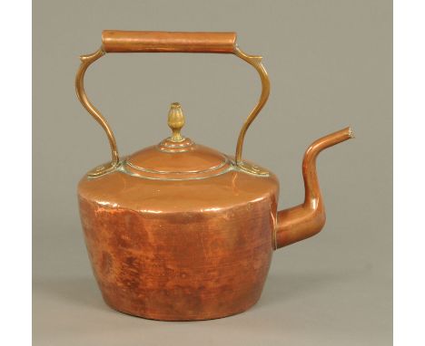 A 19th century copper kettle with brass acorn finial, height 29.5 cm.