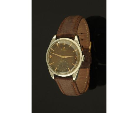 A gentleman's Omega stainless steel wristwatch with "tropical" dial, manual, with subsidiary seconds dial, leather strap with