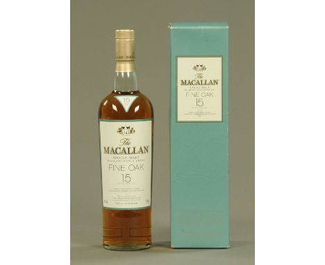 One bottle "Macallan" single malt fine oak 15 Scotch Whisky, boxed, cellar stored.