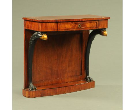 An early 19th century mahogany console table, with bowed front and frieze drawer, raised on scroll supports with paw feet and