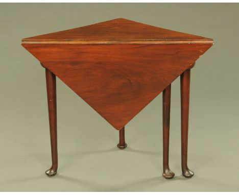 A Georgian mahogany triangular single drop flap occasional table, with gate leg action and raised on four cabriole legs termi