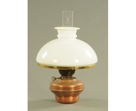 A Victorian brass and copper hanging oil lamp.