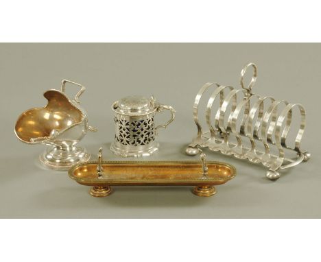 A Victorian pen tray, a tankard shaped silver plated mustard, toast rack and sugar basin.