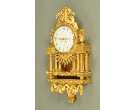 A Continental gilt painted wooden wall clock, with two-train striking movement by Lenzkirch.  Height 93 cm, width 44 cm.  CON