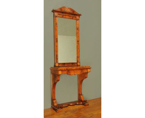 A 19th century French mahogany console table, the mirror frame with shaped pediment and moulded beaded edge, the base with mo