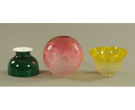 Three Victorian glass lamp shades, cranberry ball shape, green and yellow.  Largest diameter 20 cm. CONDITION REPORT: The gre