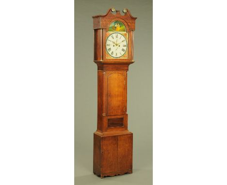 An early 19th century oak longcase clock, with painted dial and two train striking movement and with three quarter length tru