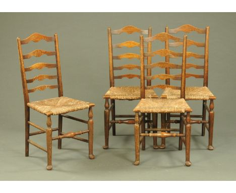 Four 19th century ash rush seat ladder back country kitchen dining chairs raised on turned legs with pad feet. CONDITION REPO