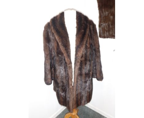 A LADIES VINTAGE MID-LENGTH FUR COAT and a stole, both monogrammed with the initials 'M P'