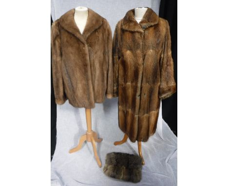 HARRISON'S OF WORCESTER & LUTON: A  vintage long fur coat, circa 1950, another short fur coat and a muffler(3)