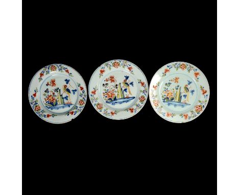 Three English delft polychrome plates, Bristol, mid 18th Century, painted with a parakeet and flowering foliage in the manner