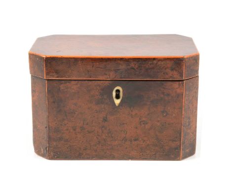 A George III yew wood tea caddy, of oblong form with canted corners, boxwood outline, bone escutcheon, width 18cm, height 12c
