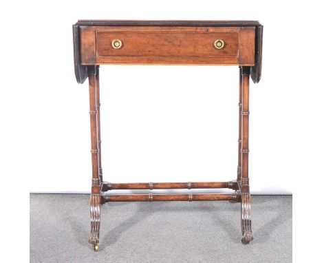 A Regency style drop-leaf occasional table, circa 1900, of sofa table design, D-shape leaves with rosewood banding and string