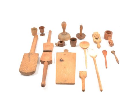 A beechwood pastry mould, 14cm; a pastry roller; butter pats; and other kitchenalia.