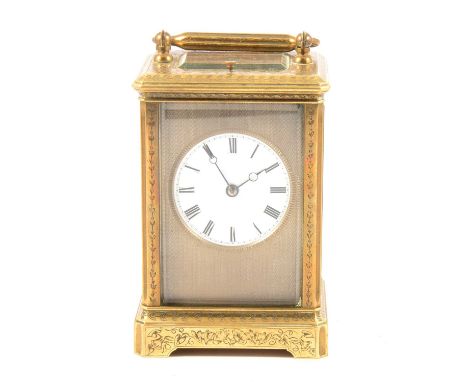A French repeating carriage clock, engraved brass case, white enamel dial, engine-turned gilt slip, platform escapement, hour
