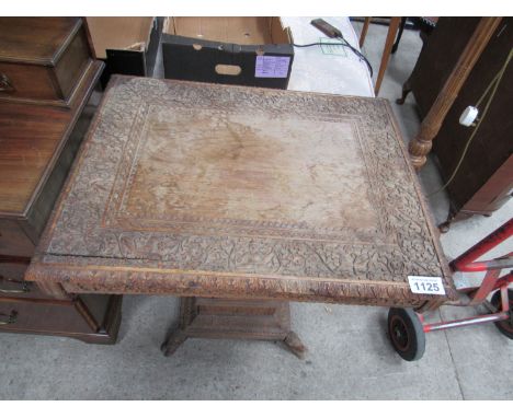  Sale Item:    HEAVILY CARVED CENTRE TABLE (AF)   Vat Status:   No Vat   Buyers Premium:  This lot is subject to a Buyers Pre