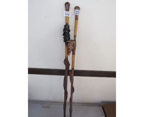  Sale Item:    2 TRIBAL WALKING STICKS (AF)   Vat Status:   No Vat   Buyers Premium:  This lot is subject to a Buyers Premium