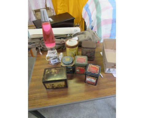  Sale Item:    MATHMOS LAVA LAMP & 6 TINS   Vat Status:   No Vat   Buyers Premium:  This lot is subject to a Buyers Premium o
