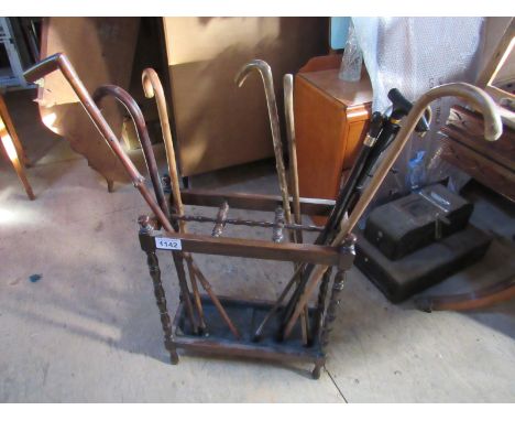  Sale Item:    OAK STICK STAND & STICKS (AF)   Vat Status:   No Vat   Buyers Premium:  This lot is subject to a Buyers Premiu