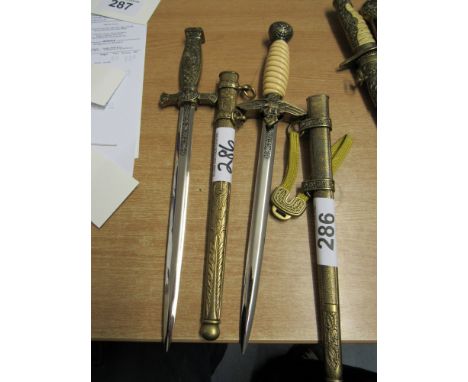  Sale Item:    2 ORNAMENTAL KNIVES   Vat Status:   No Vat   Buyers Premium:  This lot is subject to a Buyers Premium of 15% +