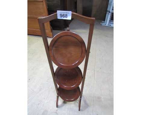  Sale Item:    FOLDING CAKE STAND   Vat Status:   No Vat   Buyers Premium:  This lot is subject to a Buyers Premium of 15% + 