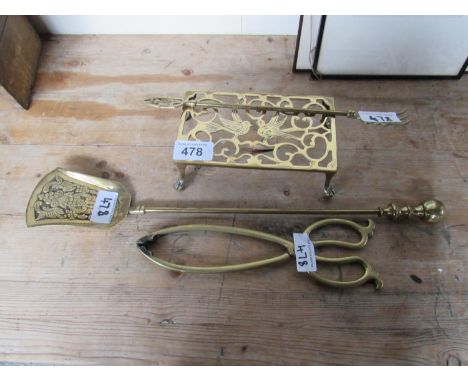  Sale Item:    BRASS TRIVET & POKER TONGS   Vat Status:   No Vat   Buyers Premium:  This lot is subject to a Buyers Premium o