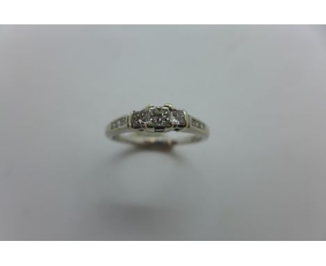 A 9ct hallmarked white gold and diamond ring, size K - approx 1.8 grams, in good condition 