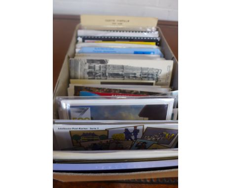 A large collection of vintage-modern postcards, envelopes and postal history both used and mint with a number in original pac