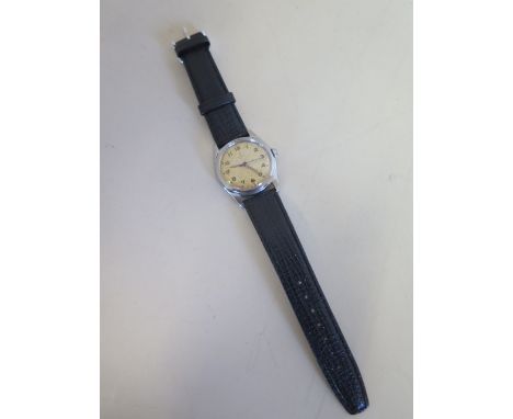 An Omega manual wind gents vintage wristwatch, 32mm dial in running order, spotting to dial, case good, scratched initials SJ