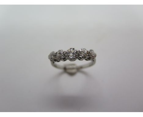 A platinum five stone diamond ring, size K/L, approx 3.4 grams, in good condition, minor wear 