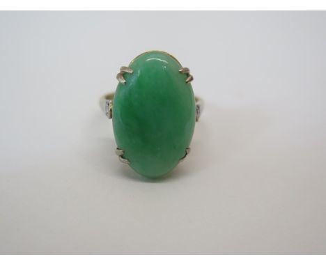 A yellow gold jade and diamond ring, tests to approx 9ct, ring size J/K, approx 4.3 grams, generally good 