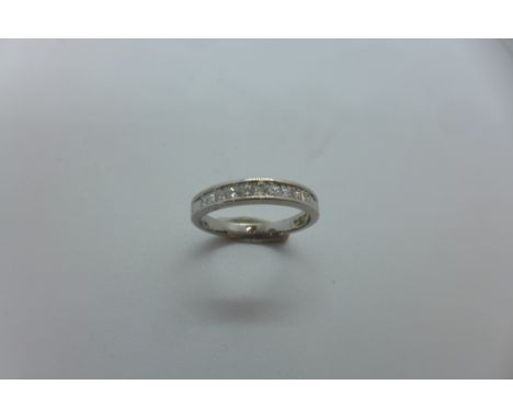 An 18ct white gold princess cut diamond half eternity ring from Beaverbrooks, 0.25ct, 2.2 grams, size I,  - in good condition