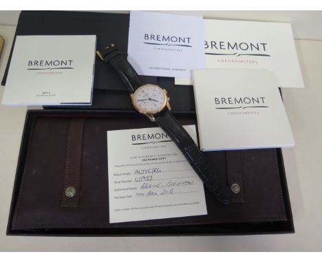 An 18ct gold Bremont ALT1-C rose gold classic chronograph chronometer gents wristwatch with white dial and black crocodile st