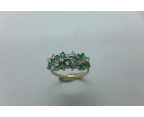 A hallmarked 9ct white gold diamond and emerald ring, size N, approx 2.8 grams, generally good 