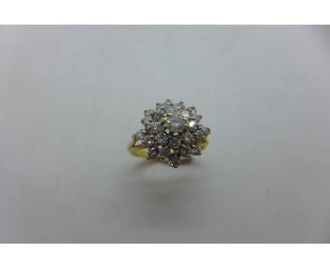 An 18ct gold diamond cluster ring, size J - 4.2 grams, 1.00ct - size J, approx 4.2 grams,  in good condition 