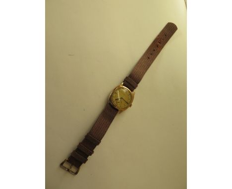 An interesting football presentation 9ct manual wind wristwatch with a terminus Swiss movement, engraved From Cambridge Town 
