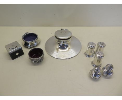 Three assorted silver cruet pieces and two peppers, marked WANG HING, a part trinket box, an Eastern salt with liner, and a p