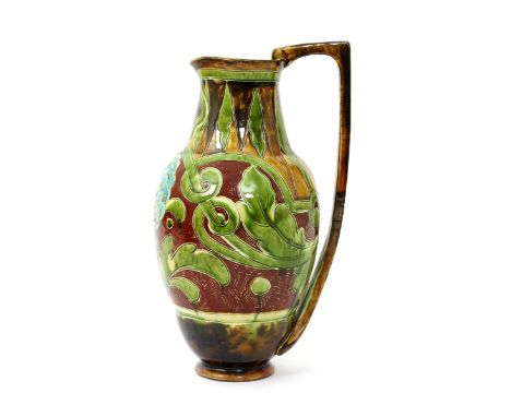 A Burmantofts Faience ewer, model no.2162, incised with a Persian flower-head on scrolling Art Nouveau flower stems, in turqu