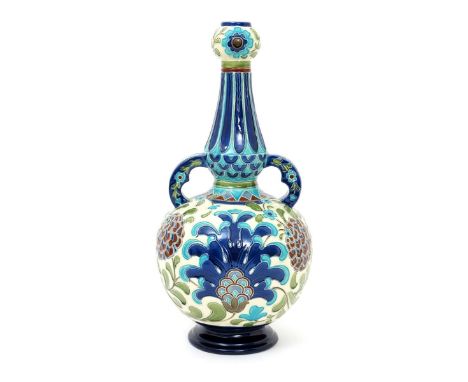 A Burmantofts Faience Persian vase, model no.2065, ovoid with tapering cylindrical neck and knopped rim, applied handles to s