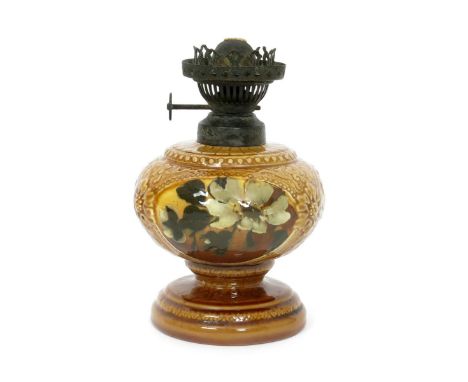 A rare Burmantofts Faience Barbotine Veritas oil lamp, footed ovoid form, painted with three simple wild flower roundels, in 